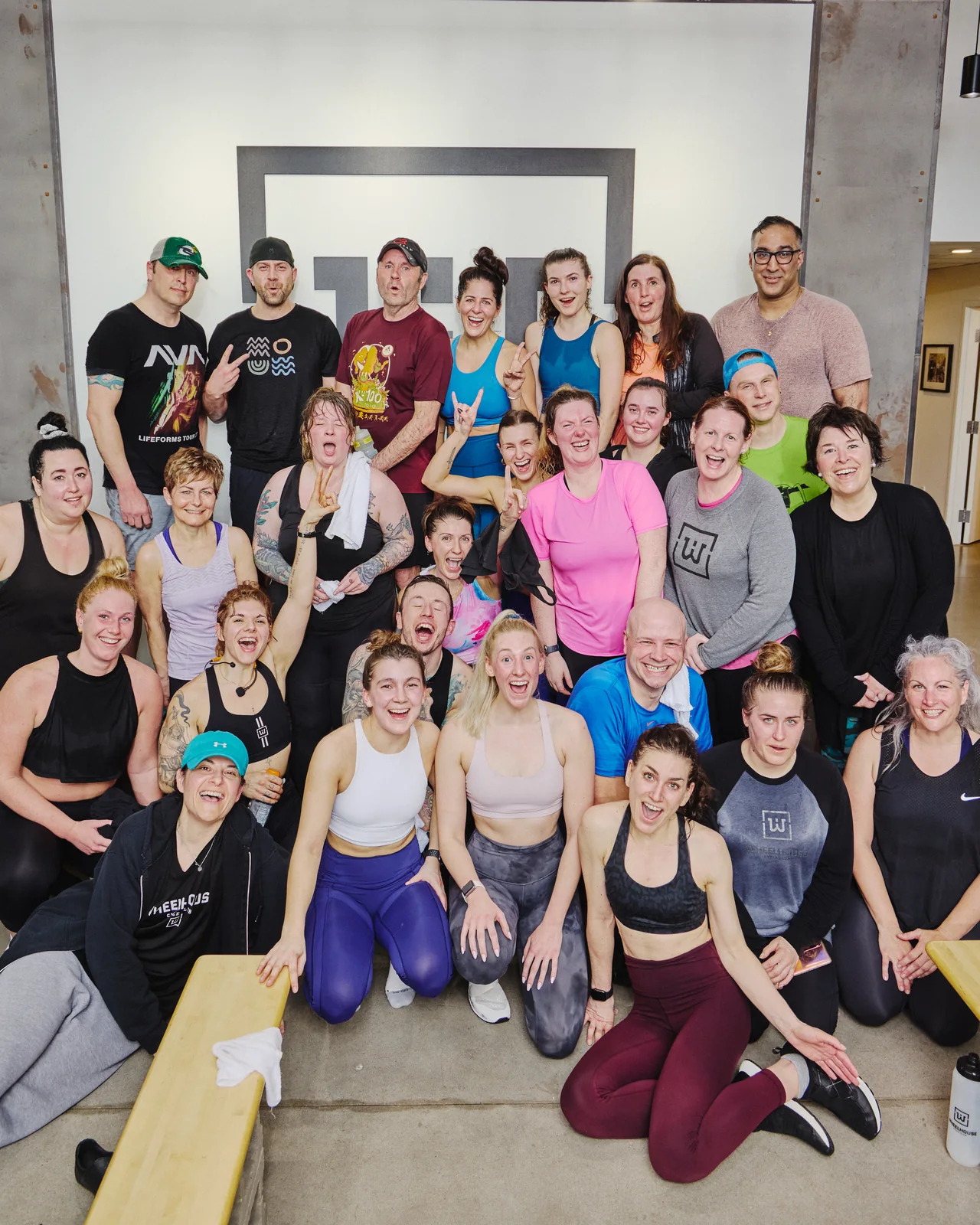 Wheelhouse riders celebrating together after a class